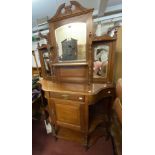 A 1.09m Edwardian walnut display cabinet with multiple bevelled plates, shelves and slender turned