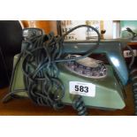 A vintage Trimphone in two tone green