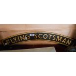 A modern painted cast iron Flying Scotsman sign