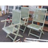 Three painted wood folding garden chairs