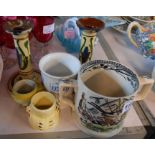 A small selection of ceramic items comprising Oxo mug, Burleigh Farmers Arms loving cup, Torquay
