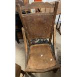 A late 19th Century continental stained mixed wood nursing chair with remains of machine pressed