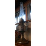 A chrome plated Aladdin oil lamp with chimney - shade missing