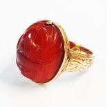 An unmarked carnelian scarab panel ring