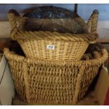 Four woven and wicker log baskets of various sizes