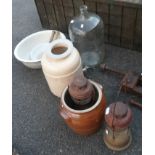 An old water dispenser - sold with a ceramic pot and two lanterns