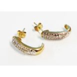 A pair of import marked 375 gold curved panel diamond set ear-rings - boxed