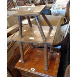Two antique rustic elm topped stools, both set on simple supports