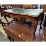 A reproduction mahogany coffee table with green leather under glass insert top, set on cabriole legs
