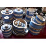 A selection of TG Green Cornishware and other blue banded kitchen wares including storage jars,