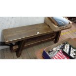 A 1.2m heavy stained pine form bench with solid plank top, set on A-frame base with rail stretcher