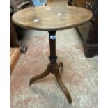 A 19th Century mahogany pedestal tilt-top wine table - old repair to tripod base