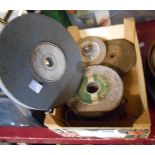 A small box containing six grinding wheels