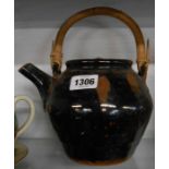 A Winchcombe pottery stoneware teapot decorated with a tenmoku glaze