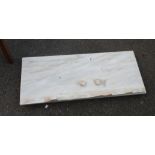 A white marble plinth