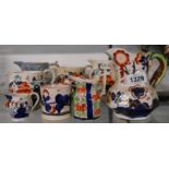 A graduated set of four Allerton Gaudy Welsh jugs - sold with a similar hydra jug, etc.