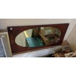An Edwardian walnut framed wall mirror with oval plate - from a wardrobe