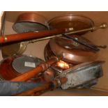 A quantity of collectable copper and brassware including bed warmers, trays, etc.