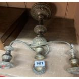 A silver plated twin branch three light candelabrum