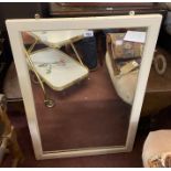 A vintage painted wood framed oblong wall mirror