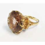 A 9ct. gold smokey quartz dress ring