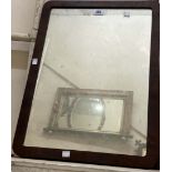 An antique mahogany framed wall mirror with rounded corners and oblong plate - from a dressing