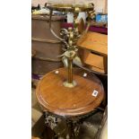 An antique brass telescopic oil lamp standard with walnut wine table surface, set on heavy