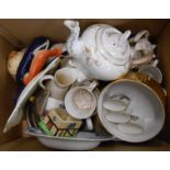 A box containing assorted ceramic items
