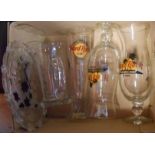 A box containing three Hard Rock Cafe drinking glasses, a Dartington tankard and moulded glass