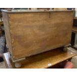 An 84cm Victorian camphor wood linen chest with lift-top, set on turned feet - one hinge a/f, old