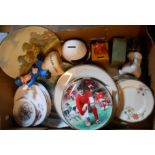 A box containing assorted ceramic and other items including novelty money boxes, collectors' plates,