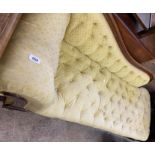 A 1.83m Victorian walnut part show frame chaise longue with faded gold button back upholstery, set