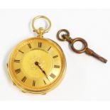 An early 20th Century marked 18k yellow metal cased lever fob watch with decorative gilt dial,