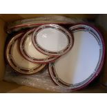 A box containing a Victorian part dinner service including tureens, large comport, plates, etc.