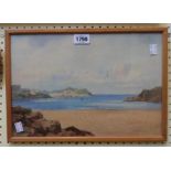 Louis Mortimer: a framed watercolour, depicting a Westcountry coastal scene with town beyond - 24.