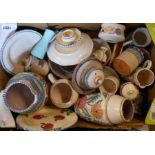 A box containing a quantity of Poole and Honiton pottery items including preserve pots, jugs, bowls,