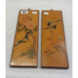 A pair of small vintage Oriental decorative bamboo wall plaques with incised decoration