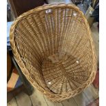 A wicker tub chair