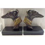 A pair of modern cast brass greyhound head pattern bookends on wooden stands