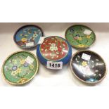 A small cloisonne circular pot and cover - sold with four small cloisonne dishes