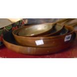 A set of five modern graduated copper pans