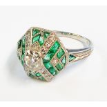 A marked PLAT Art Deco style faceted panel ring with central diamond, rows of small diamonds and