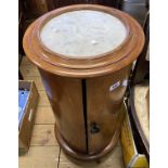 An old mahogany pedestal pot cupboard with marble inset top and circular plinth base