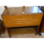 An 82.5cm vintage polished oak record cabinet with partitioned interior enclosed by a lift-top and