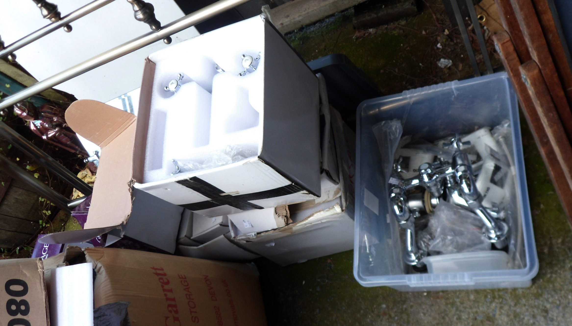 A large quantity of boxed bathroom taps - unopened