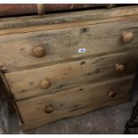 A 90cm 19th Century waxed pine chest of three long graduated drawers, set on bracket base