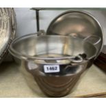 A stainless steel preserve pan containing a silver mounted ribbed glass vesta stand, plated bowl and