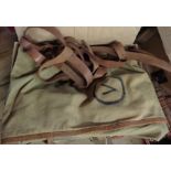 A World War II period army issue canvas bed roll with leather edging and strapping - marked for Capt