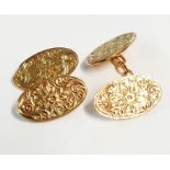 A pair of 9ct. gold cuff-links