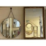 An ornate gilt framed bevelled oblong wall mirror - sold with a vintage frameless circular wall